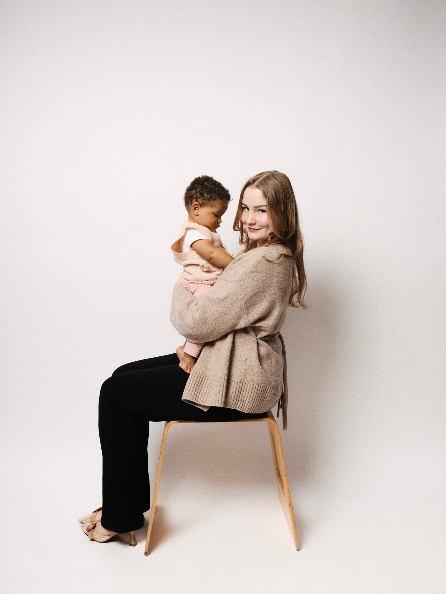 mirror.ams portrait of a mother holding her child